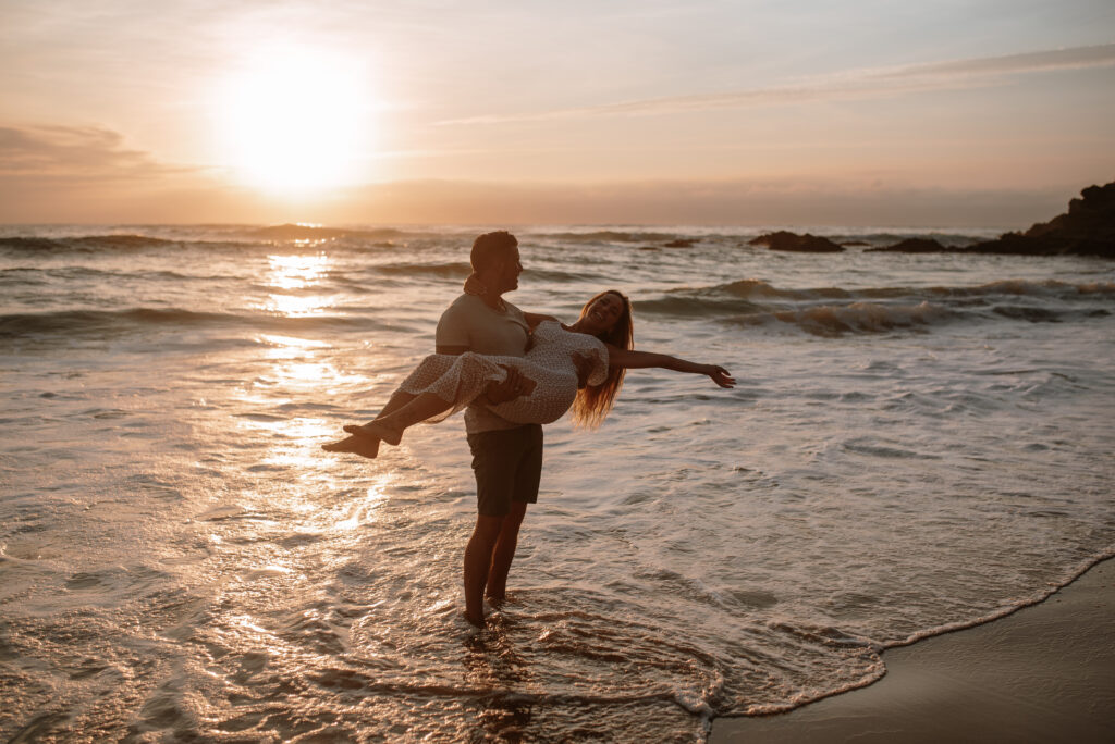 A young couple enjoying the beach and surf after moving to Laguna Beach.