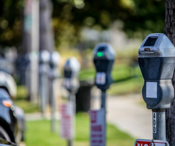 An image of parking meters in Laguna Beach.